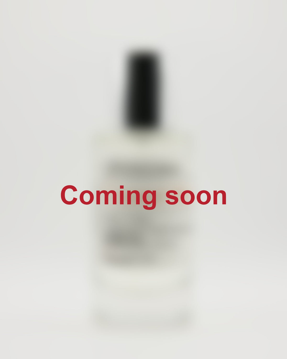 Citron Ember — Coming soon, blurred Petals & Smoke bottle photograph